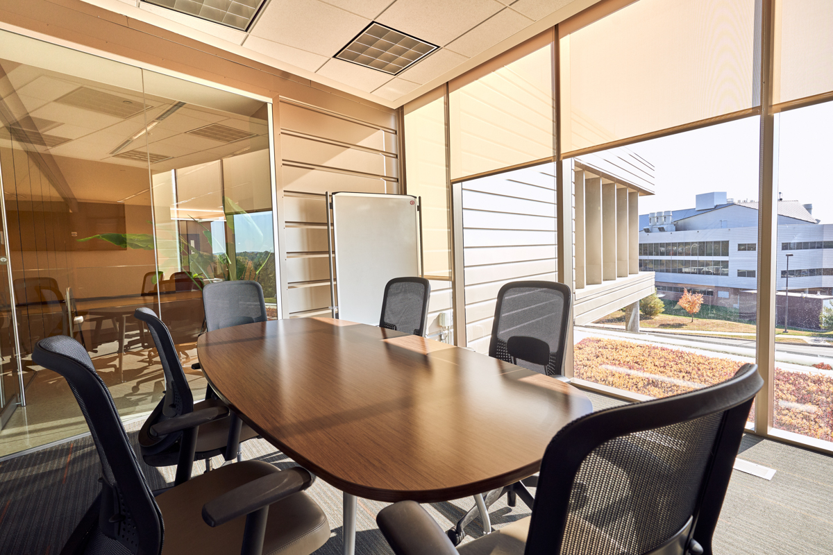 An empty well-lit meeting room at the KU Innovation Park in Lawrence.