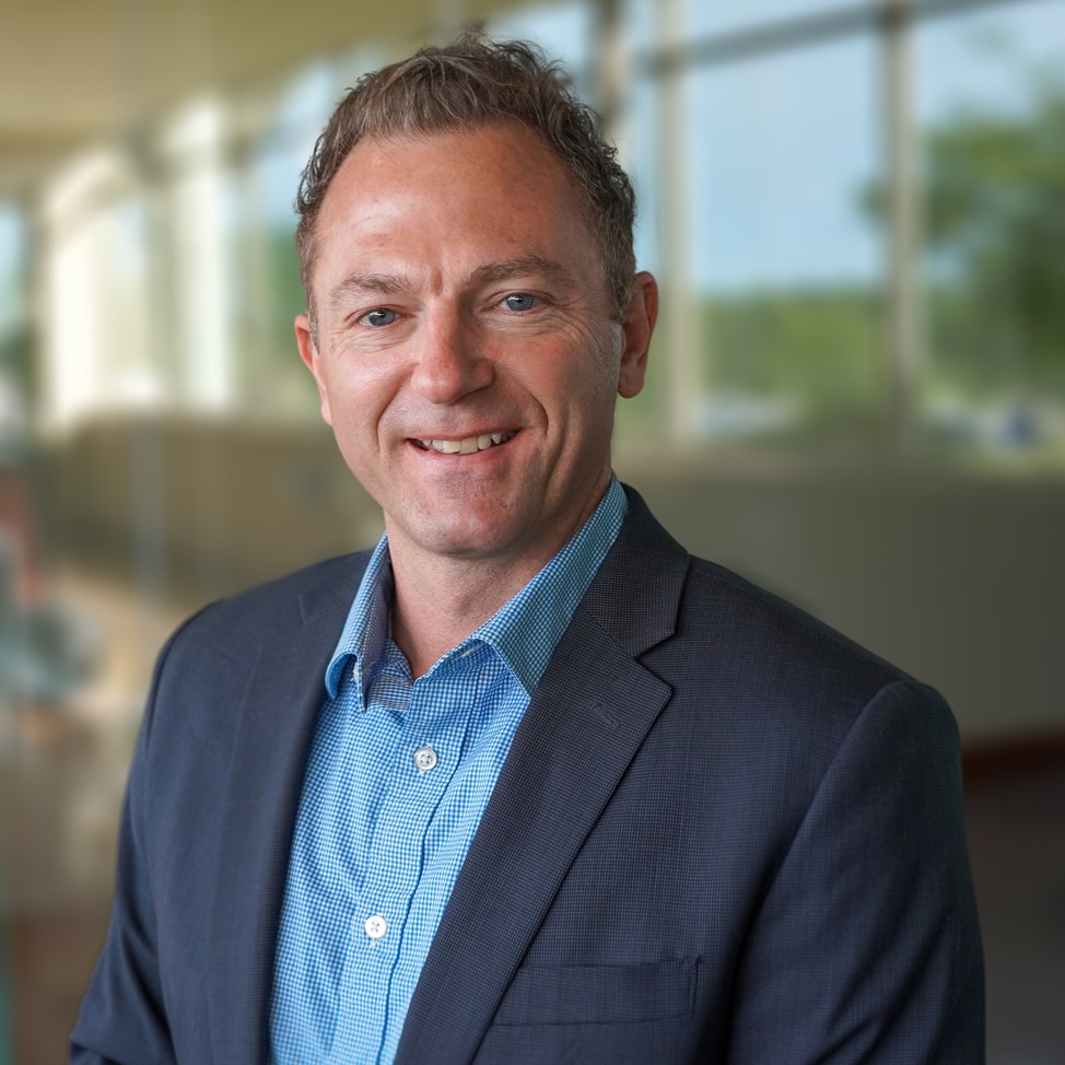 Staff-Photos-4-1 A portrait of Kerri Johnson smiling